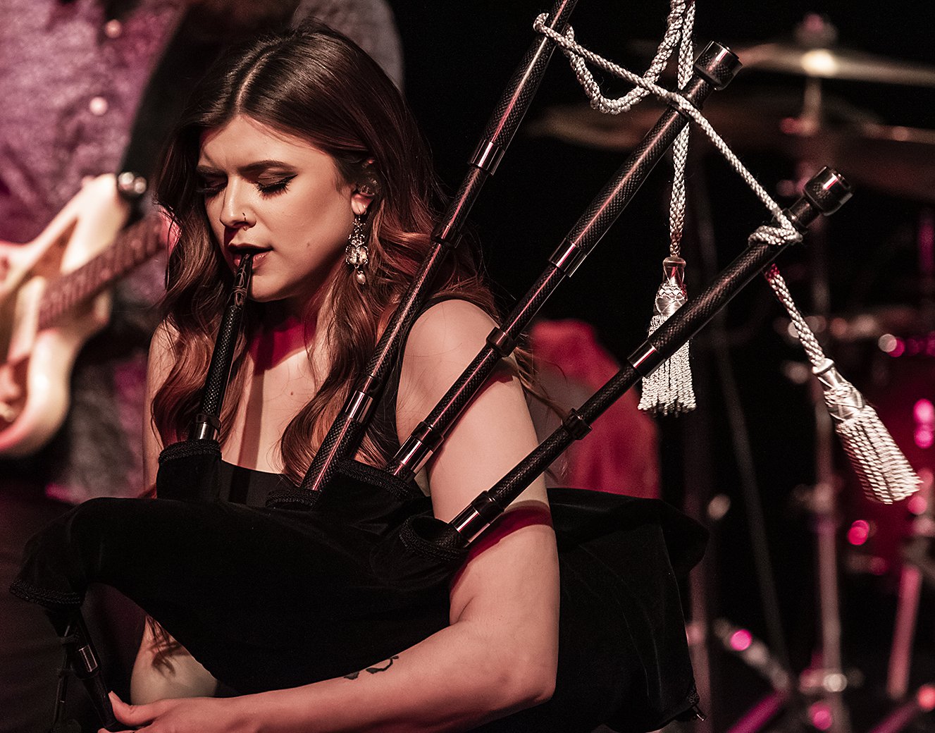 Ally performing with Carbony Great Highland Bagpipe.